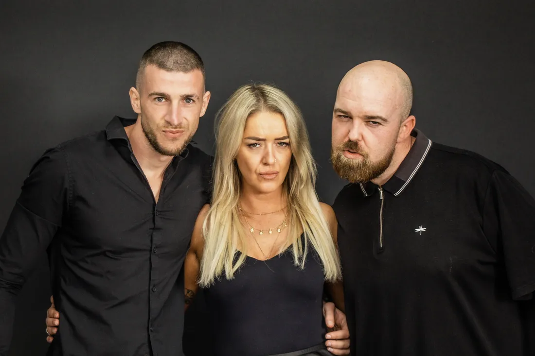 Three of the Lads 'n' Dads team pulling serious faces
